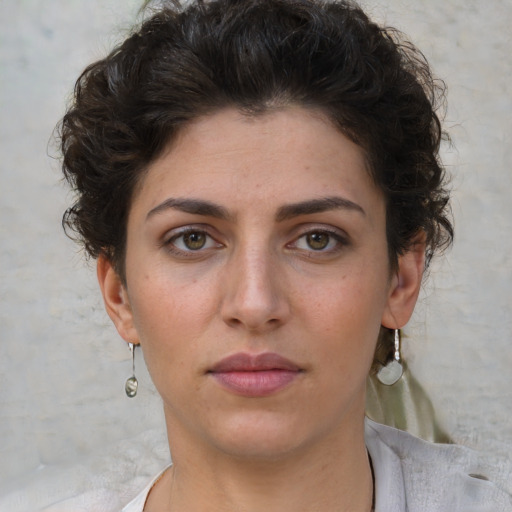 Neutral white young-adult female with short  brown hair and brown eyes