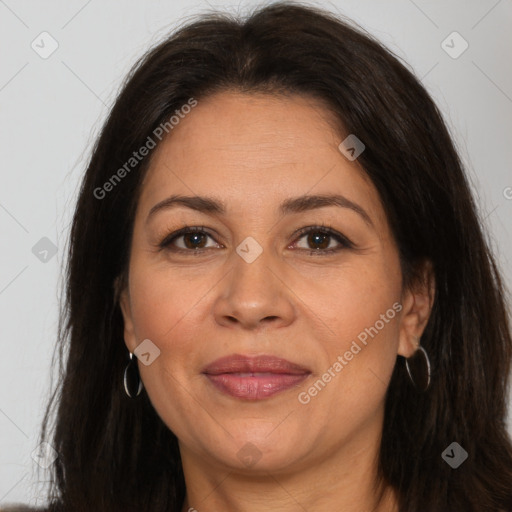 Joyful white adult female with long  brown hair and brown eyes