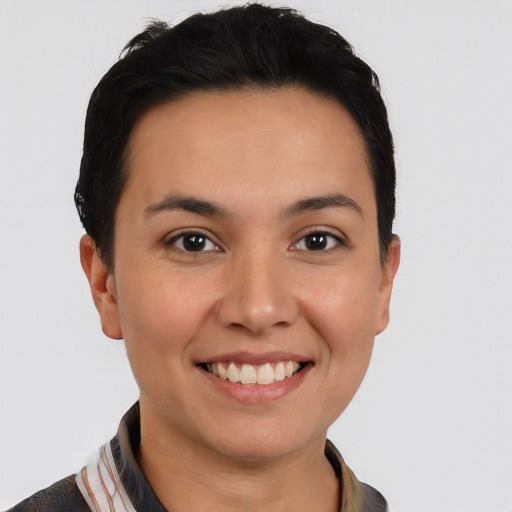 Joyful white young-adult female with short  black hair and brown eyes