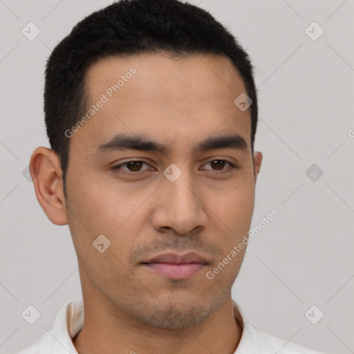 Neutral latino young-adult male with short  black hair and brown eyes