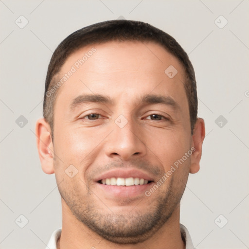 Joyful white young-adult male with short  brown hair and brown eyes