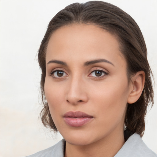 Neutral white young-adult female with medium  brown hair and brown eyes