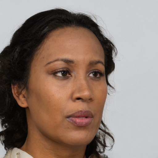 Neutral white adult female with medium  brown hair and brown eyes