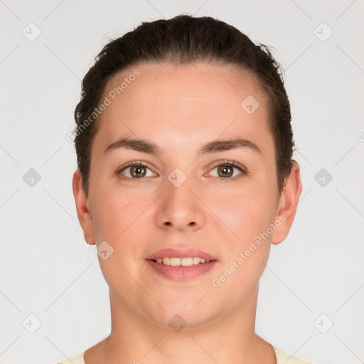 Joyful white young-adult female with short  brown hair and brown eyes