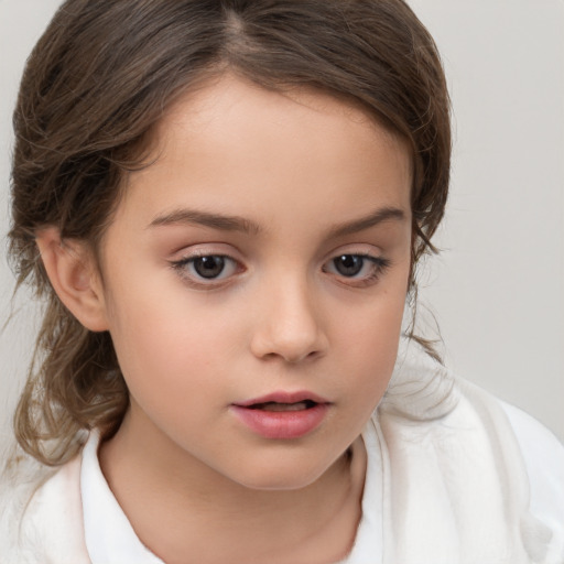 Neutral white child female with medium  brown hair and brown eyes