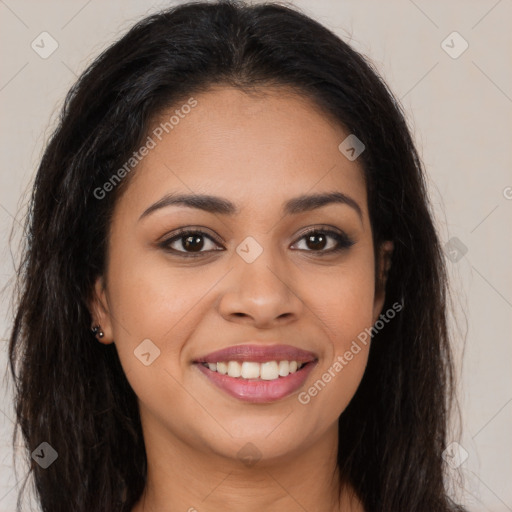 Joyful latino young-adult female with long  brown hair and brown eyes