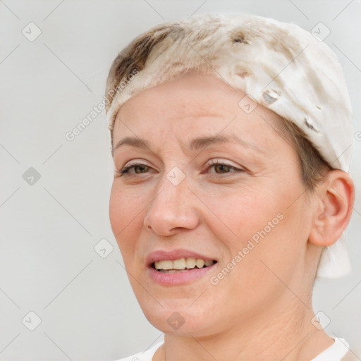 Joyful white adult female with short  brown hair and brown eyes