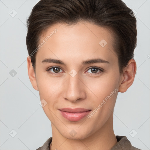 Joyful white young-adult female with short  brown hair and brown eyes