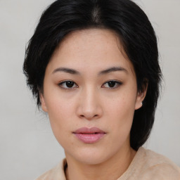 Neutral asian young-adult female with medium  brown hair and brown eyes