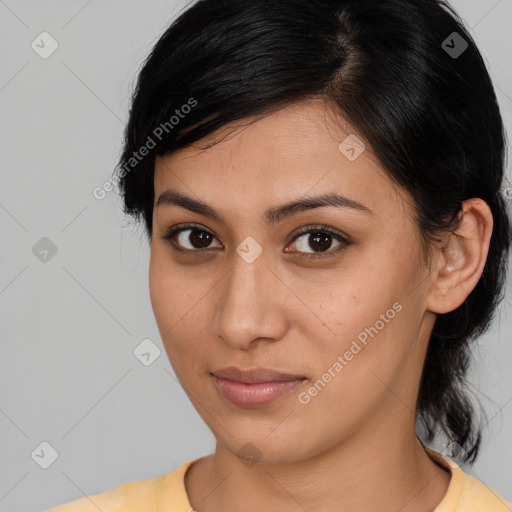 Joyful latino young-adult female with medium  brown hair and brown eyes