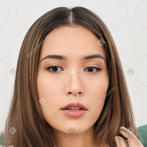 Neutral white young-adult female with long  brown hair and brown eyes