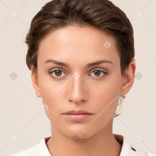 Neutral white young-adult female with short  brown hair and brown eyes