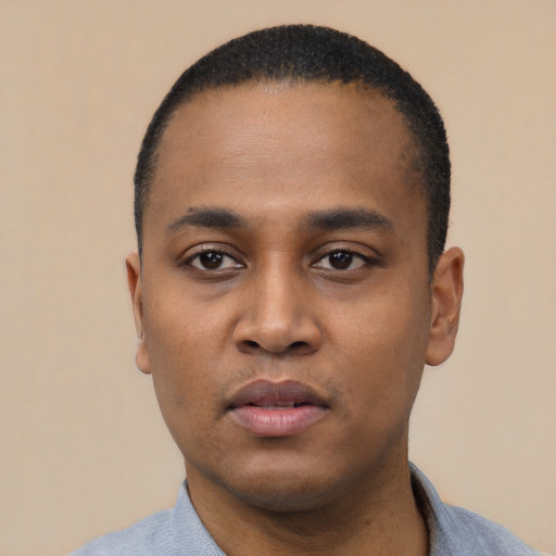Neutral black young-adult male with short  black hair and brown eyes