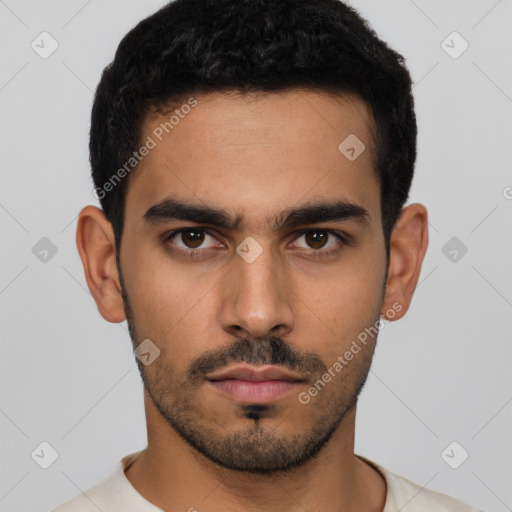 Neutral latino young-adult male with short  black hair and brown eyes