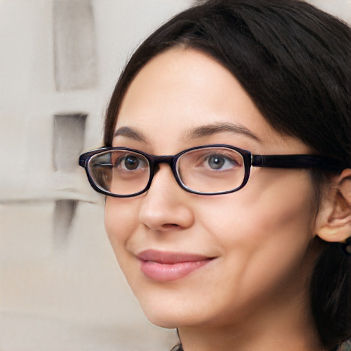 Joyful white young-adult female with medium  black hair and brown eyes