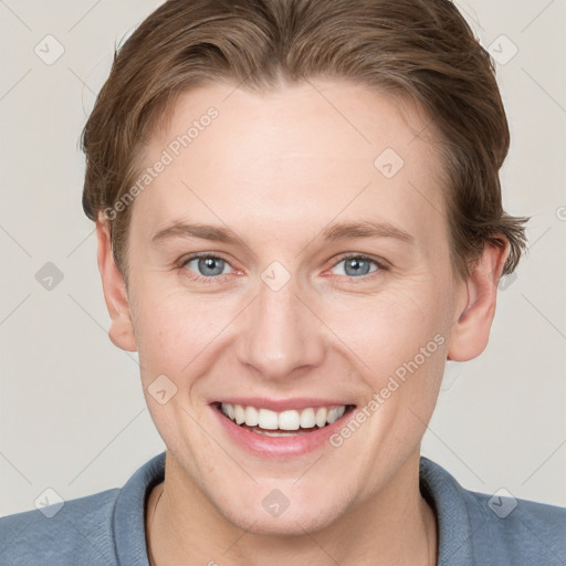 Joyful white young-adult female with short  brown hair and grey eyes