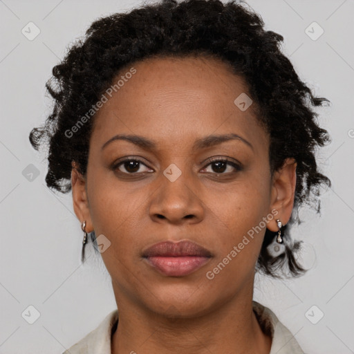 Neutral black young-adult female with short  black hair and brown eyes