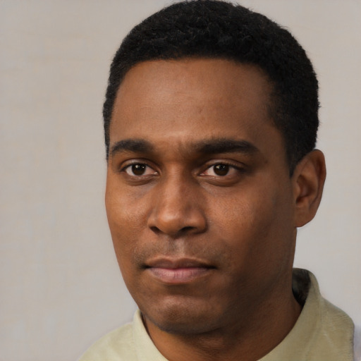 Neutral black young-adult male with short  black hair and brown eyes
