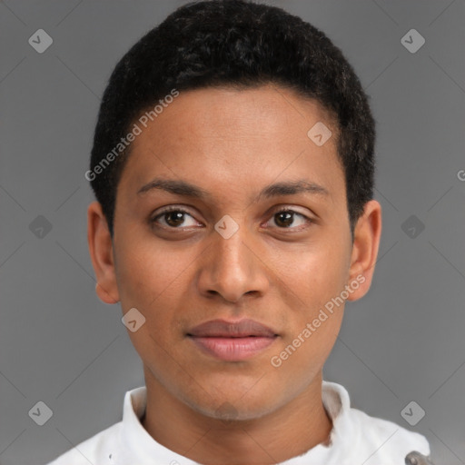 Joyful latino young-adult male with short  brown hair and brown eyes