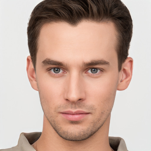 Neutral white young-adult male with short  brown hair and brown eyes