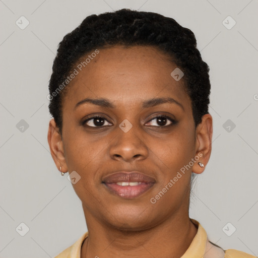 Joyful black young-adult female with short  black hair and brown eyes