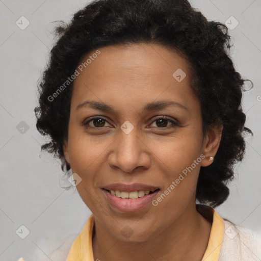 Joyful latino adult female with short  brown hair and brown eyes