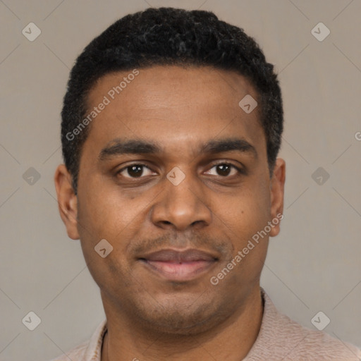 Joyful black young-adult male with short  black hair and brown eyes