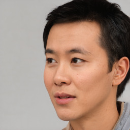 Neutral asian young-adult male with short  black hair and brown eyes