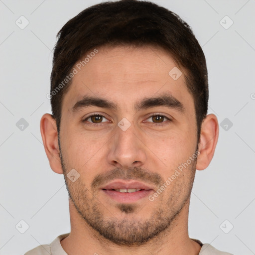 Joyful white young-adult male with short  brown hair and brown eyes