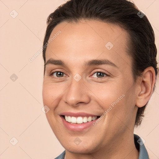 Joyful white young-adult female with medium  brown hair and brown eyes