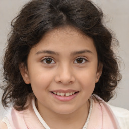 Joyful white child female with medium  brown hair and brown eyes