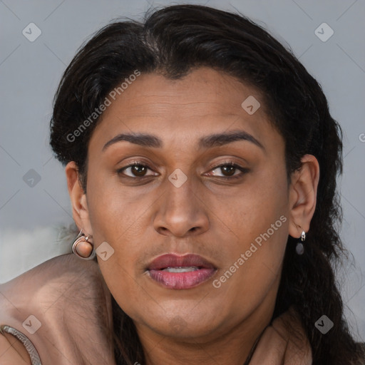 Joyful latino young-adult female with medium  brown hair and brown eyes