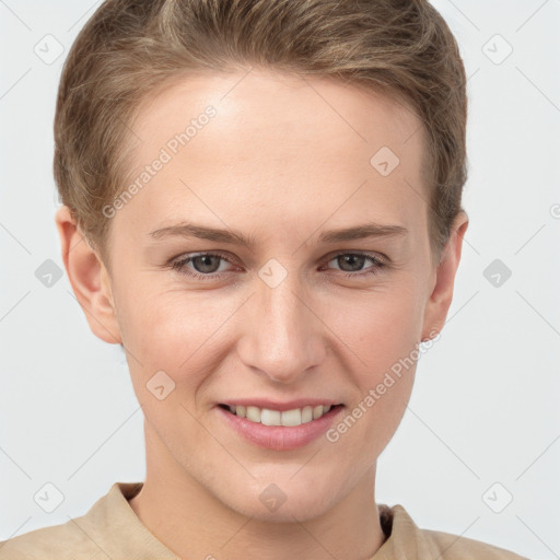 Joyful white young-adult female with short  brown hair and grey eyes