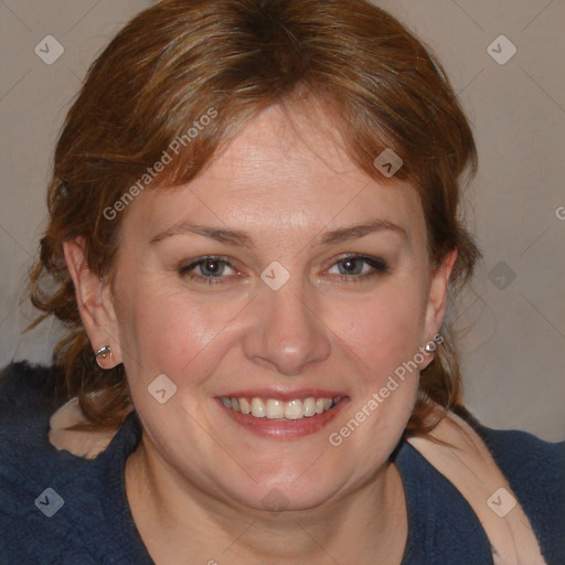 Joyful white young-adult female with medium  brown hair and blue eyes