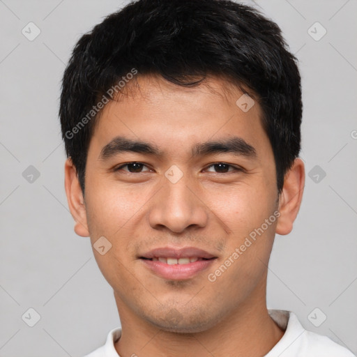 Joyful white young-adult male with short  black hair and brown eyes