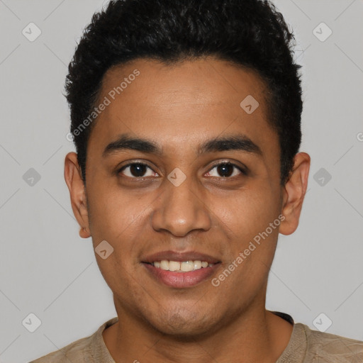 Joyful latino young-adult male with short  black hair and brown eyes