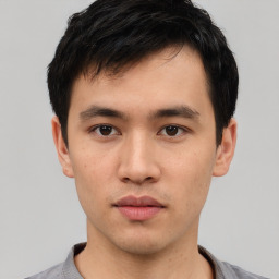 Neutral asian young-adult male with short  brown hair and brown eyes