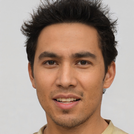 Joyful asian young-adult male with short  brown hair and brown eyes