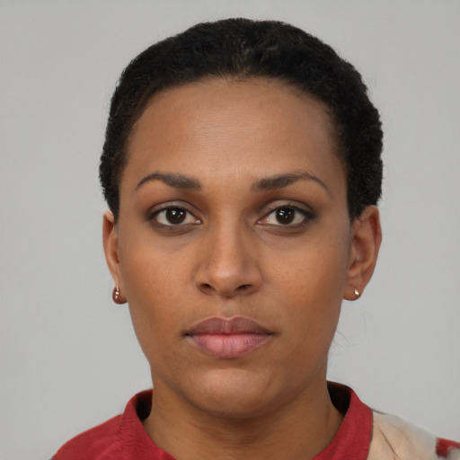 Neutral black young-adult female with short  black hair and brown eyes
