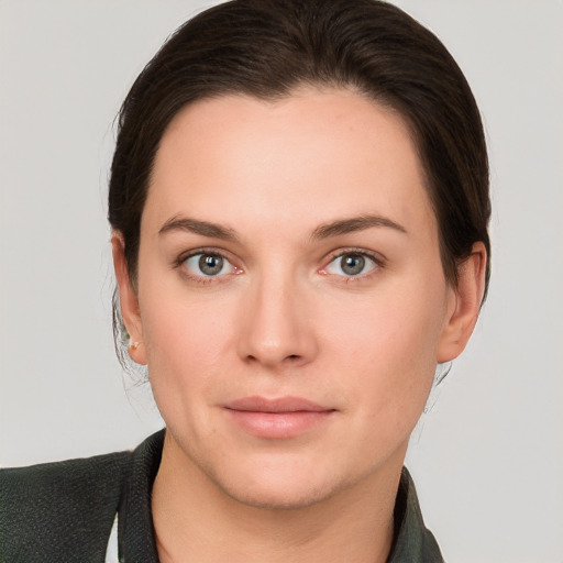 Neutral white young-adult female with short  brown hair and brown eyes