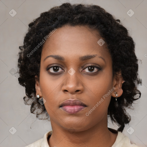 Neutral black young-adult female with medium  brown hair and brown eyes