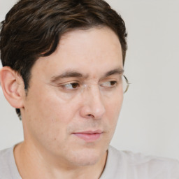 Neutral white adult male with short  brown hair and brown eyes