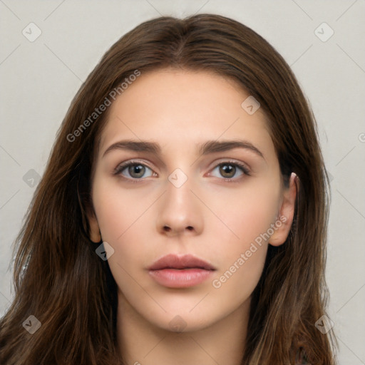 Neutral white young-adult female with long  brown hair and brown eyes