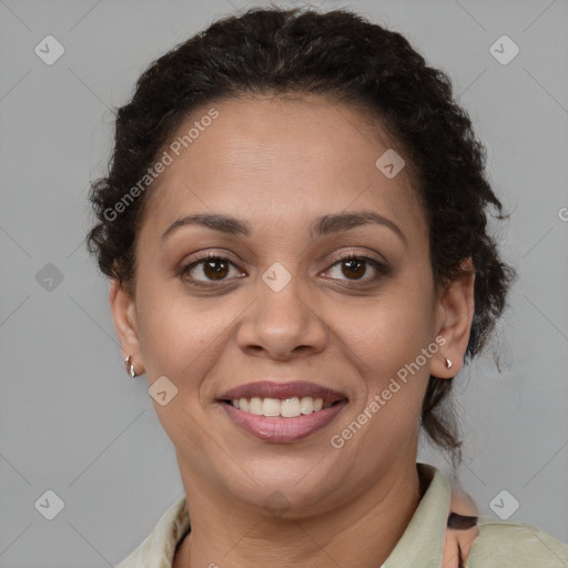 Joyful latino adult female with short  brown hair and brown eyes