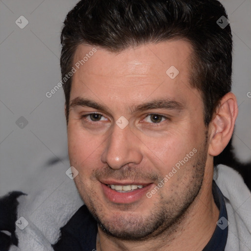 Joyful white adult male with short  brown hair and brown eyes