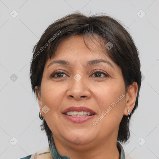 Joyful white adult female with medium  brown hair and brown eyes