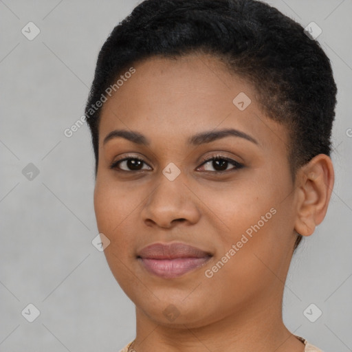 Joyful black young-adult female with short  brown hair and brown eyes