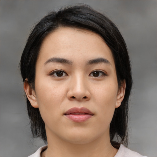 Neutral asian young-adult female with medium  black hair and brown eyes