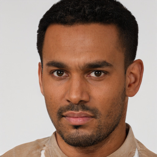 Neutral latino young-adult male with short  black hair and brown eyes