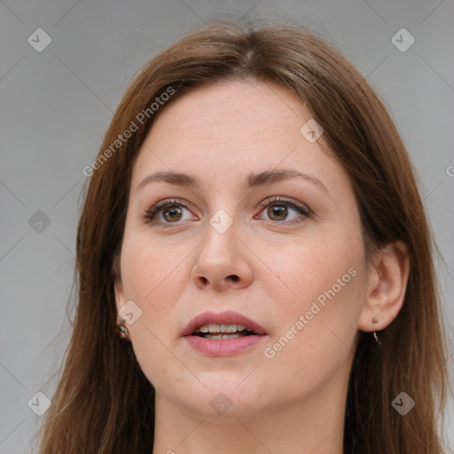 Joyful white young-adult female with long  brown hair and grey eyes